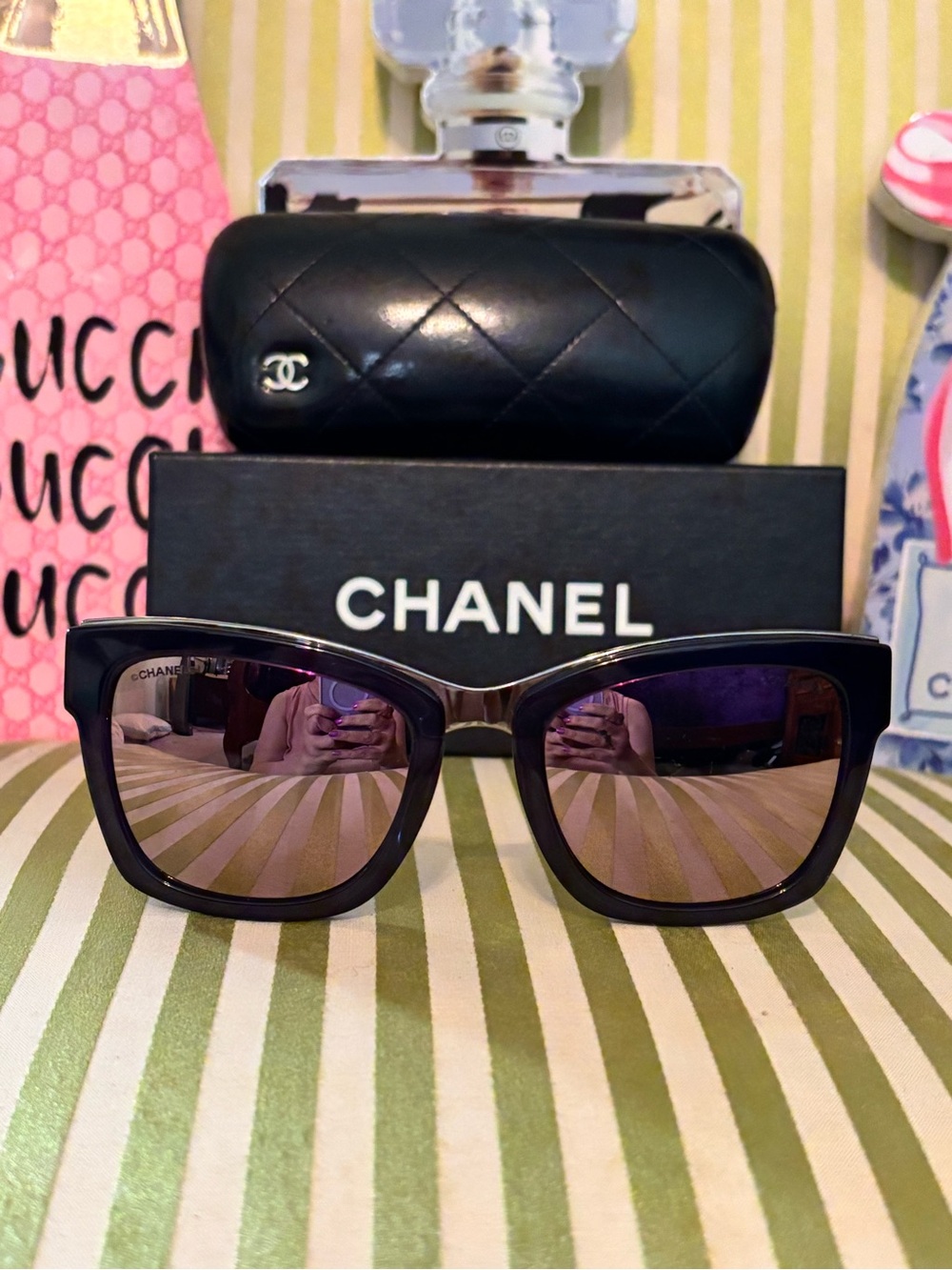CHANEL Black Sunglasses with Purple-Tinted Lenses